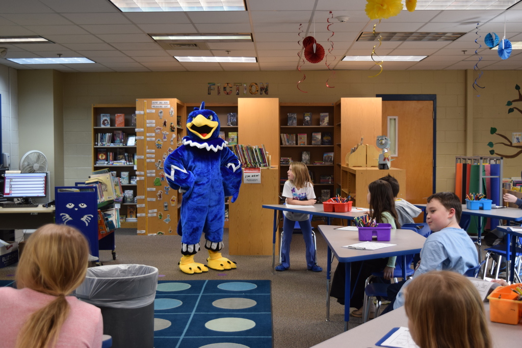 The eagle hanging out in the library with our students.