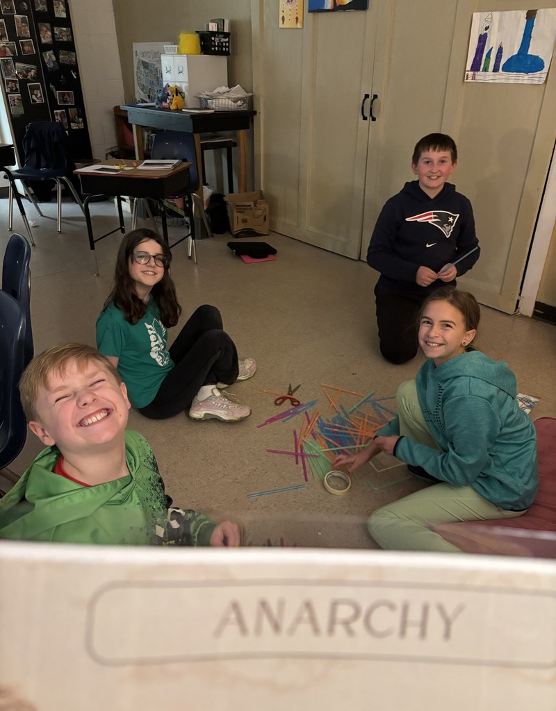 Students building a tower in the anarchy group