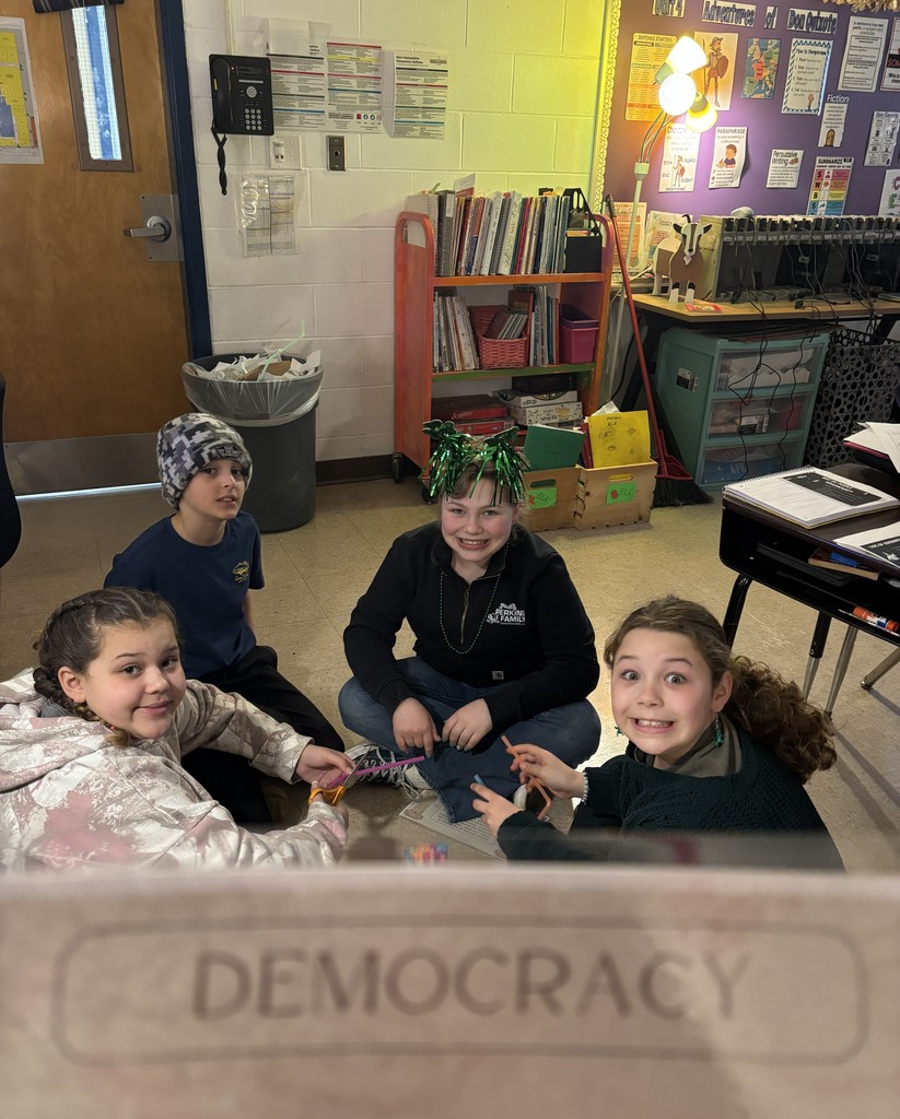 Students building a tower in the democracy group