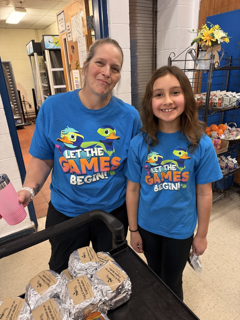 Mrs. Humes and one of our Ellis Eagles posing for a twin picture
