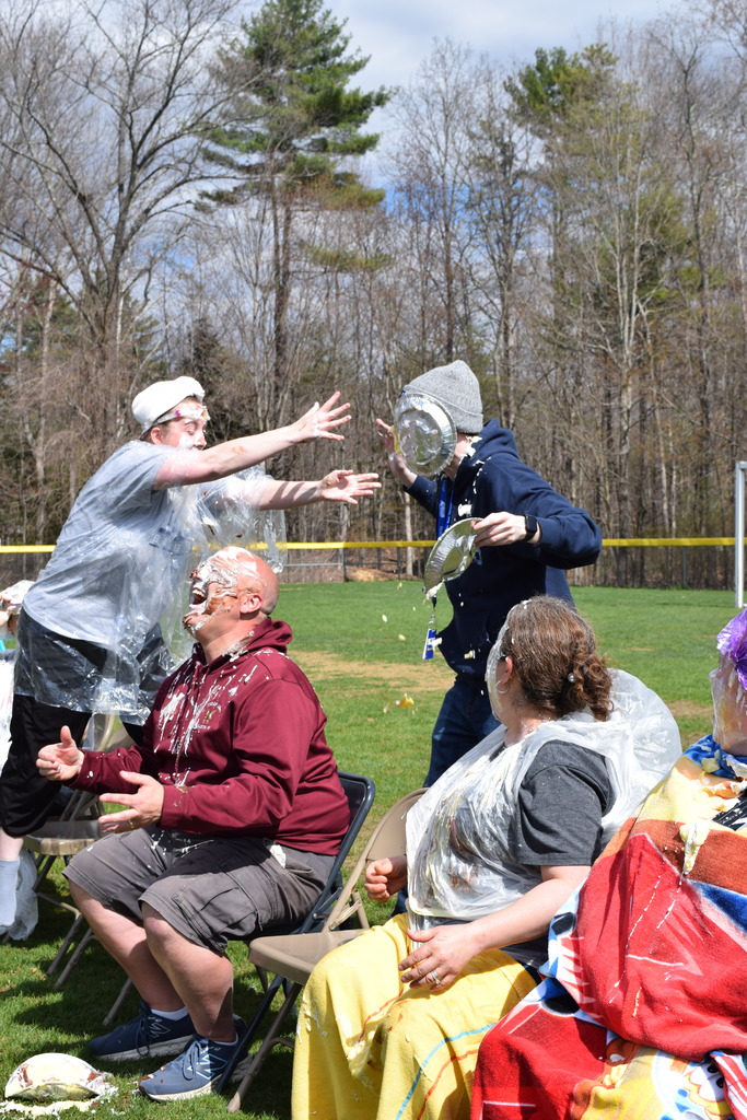 Ms. Moran pieing Mr. Wall in the face after her pied Mr. Stack!