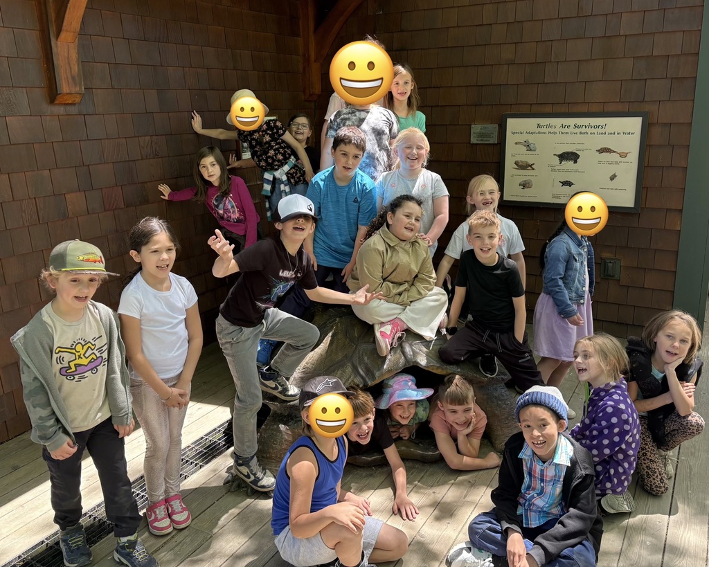 Students posing in the science center at Squam Lake.