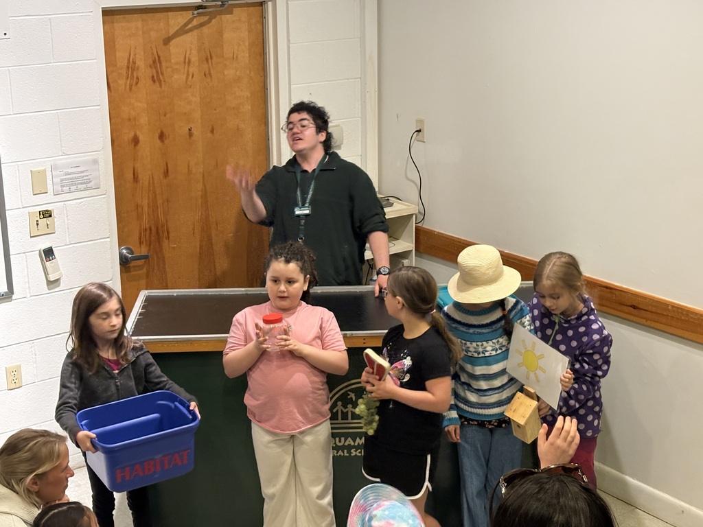 Students engaging in an activity at Squam Lake.