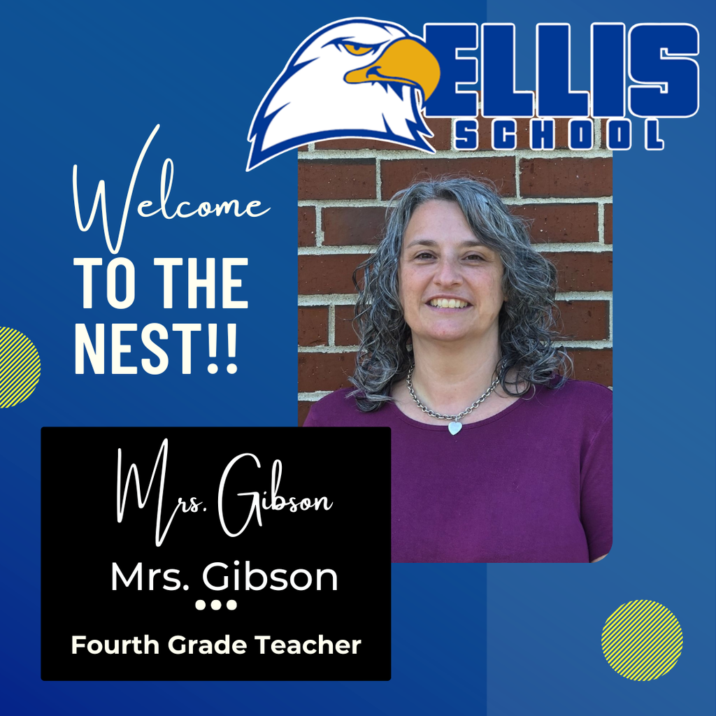A picture of Mrs. Gibson standing in front of a brick wall, smiling.