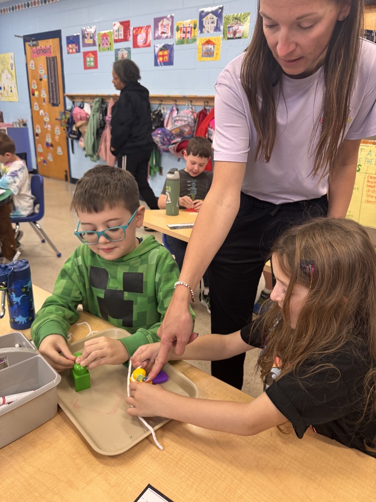 Students practicing flossing together
