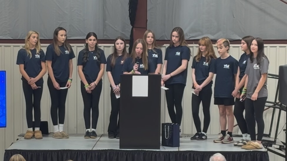 Stella speaking during their showcase presentation.