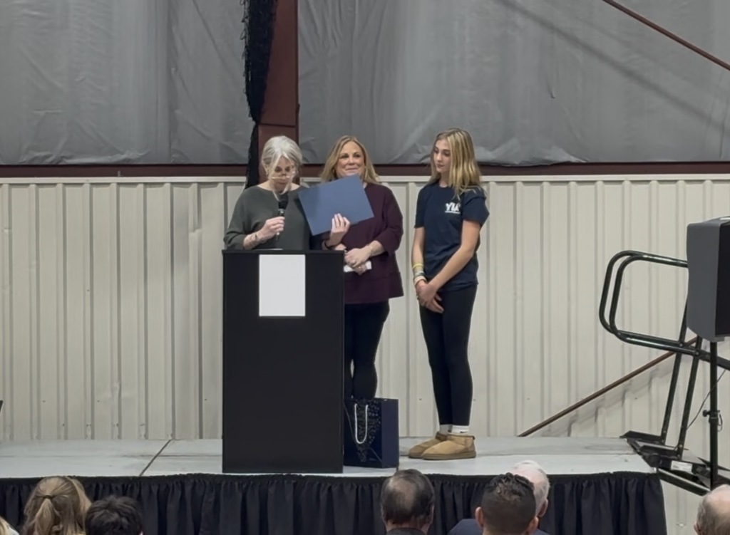 Emma being presented with her award!