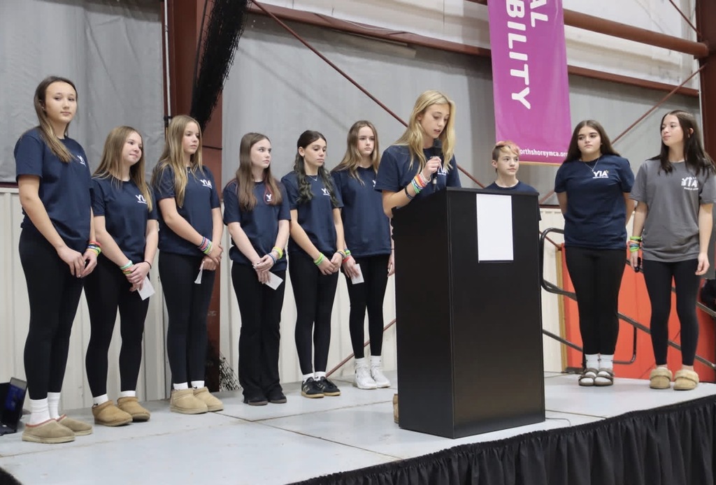Emma speaking during the YIA showcase.