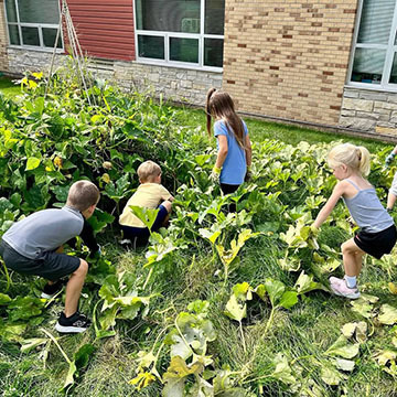 Tower Rock Students Work in the School Garden