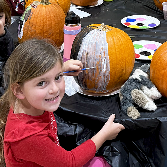 Afterschool Club Painting Pumpkins