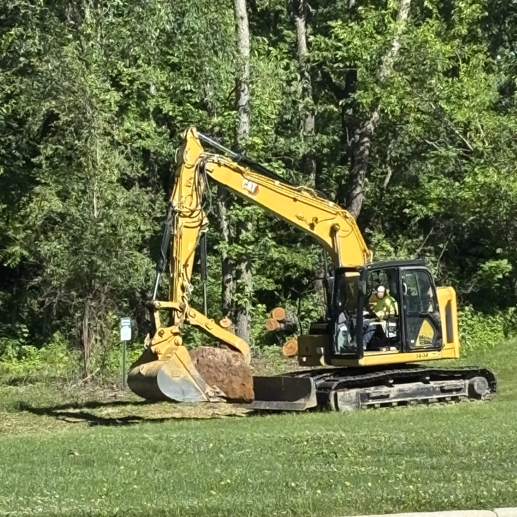 Digging the holes for new swings