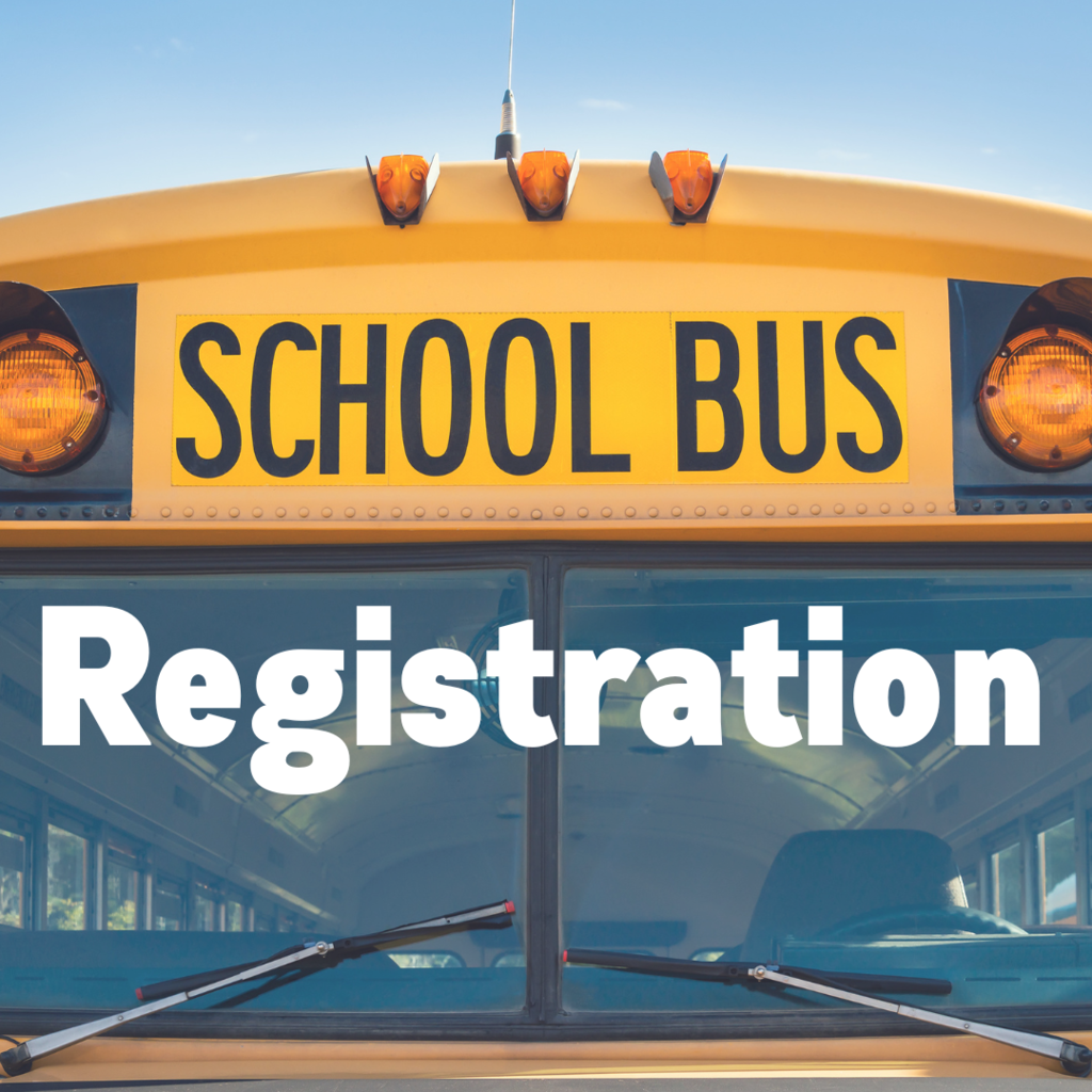A close-up image of the front of a yellow school bus with the word “SCHOOL BUS” displayed across the top. Bold white text across the windshield reads “Registration.” The bus is empty and parked, with a blue sky in the background.