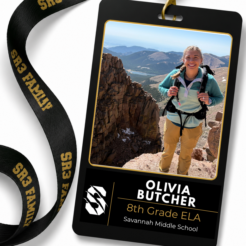 New Savannah Middle School English teacher Olivia Butcher smiles while hiking on a rocky mountain summit in Colorado.