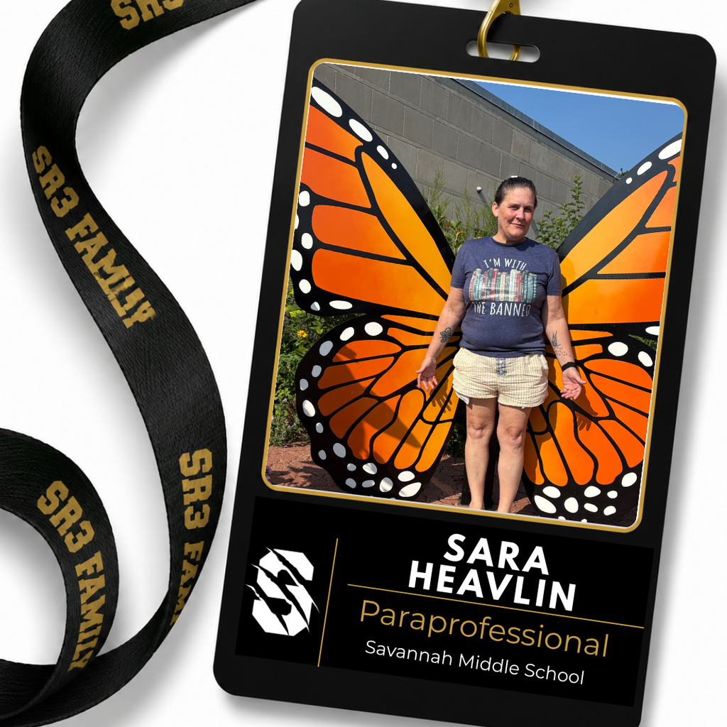 Sara Heavilin, paraprofessional at Savannah Middle School, stands in front of large orange butterfly wings, creating the appearance of butterfly wings behind her, on an SR3 staff ID badge graphic.