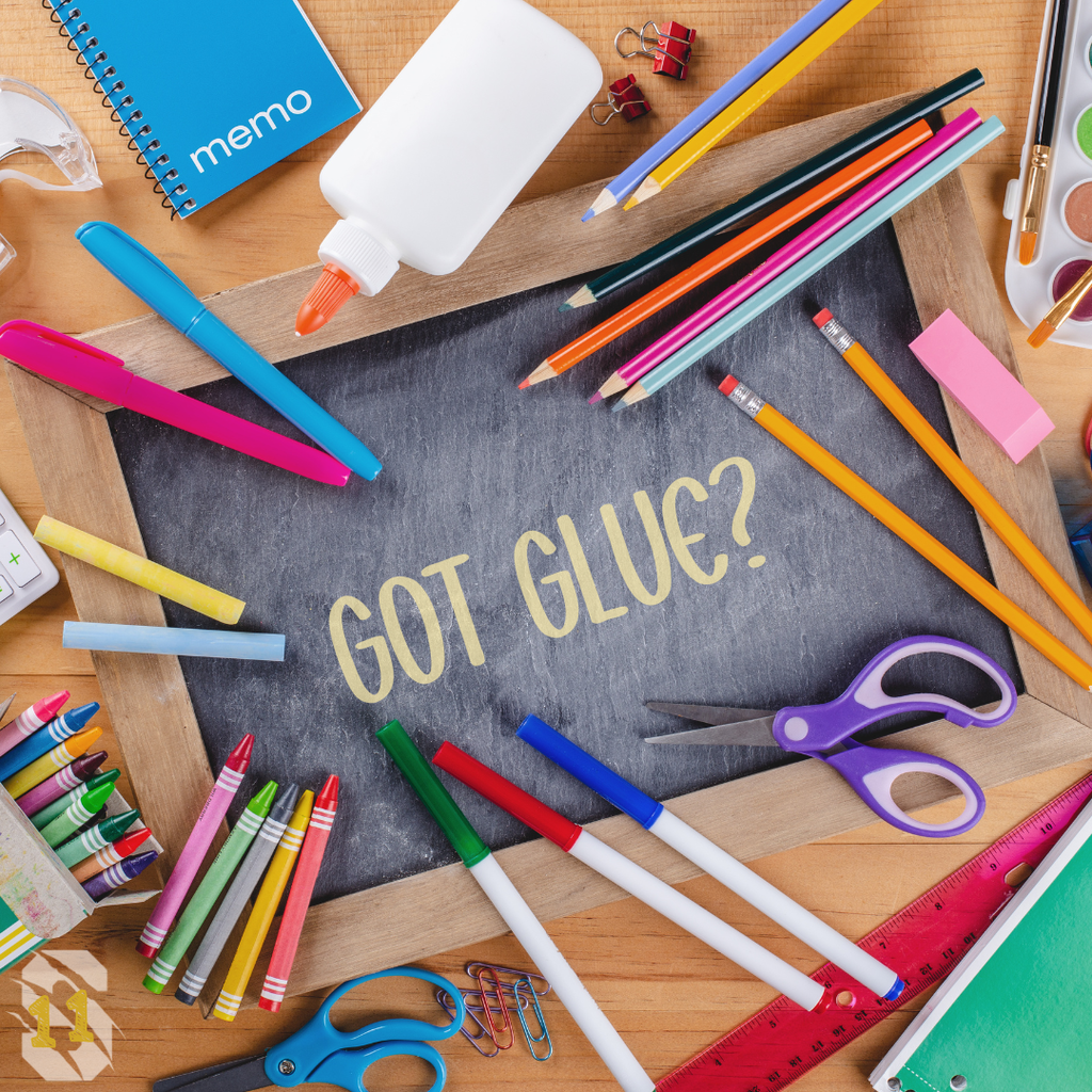 School supplies surround a chalkboard reading “Got Glue?” with a hidden 11 marking the back-to-school countdown.
