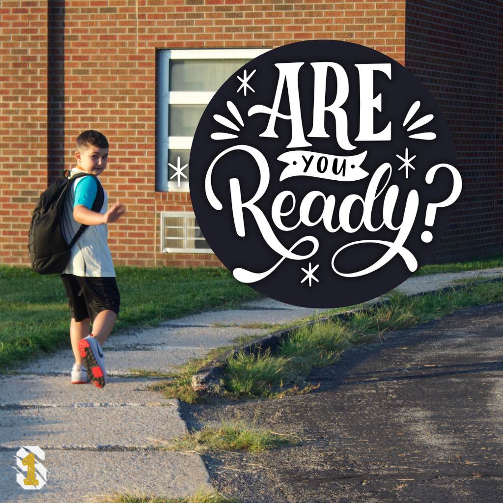 Student wearing a backpack walks toward school with the words “Are You Ready?” Countdown shows one day until school.