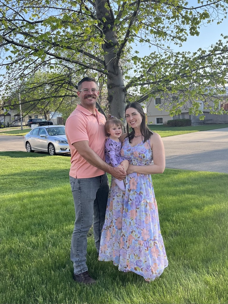 Principal Stockie with his wife and child.