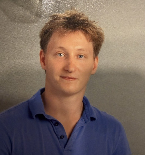 Picture of Mr. Engg in a blue polo shirt