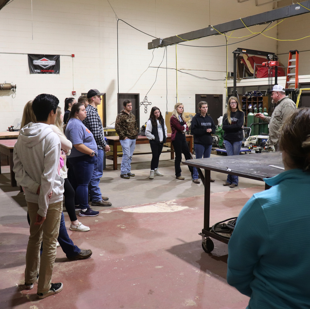 Clemson students visit Mr. Abrams' ag mechanics class.