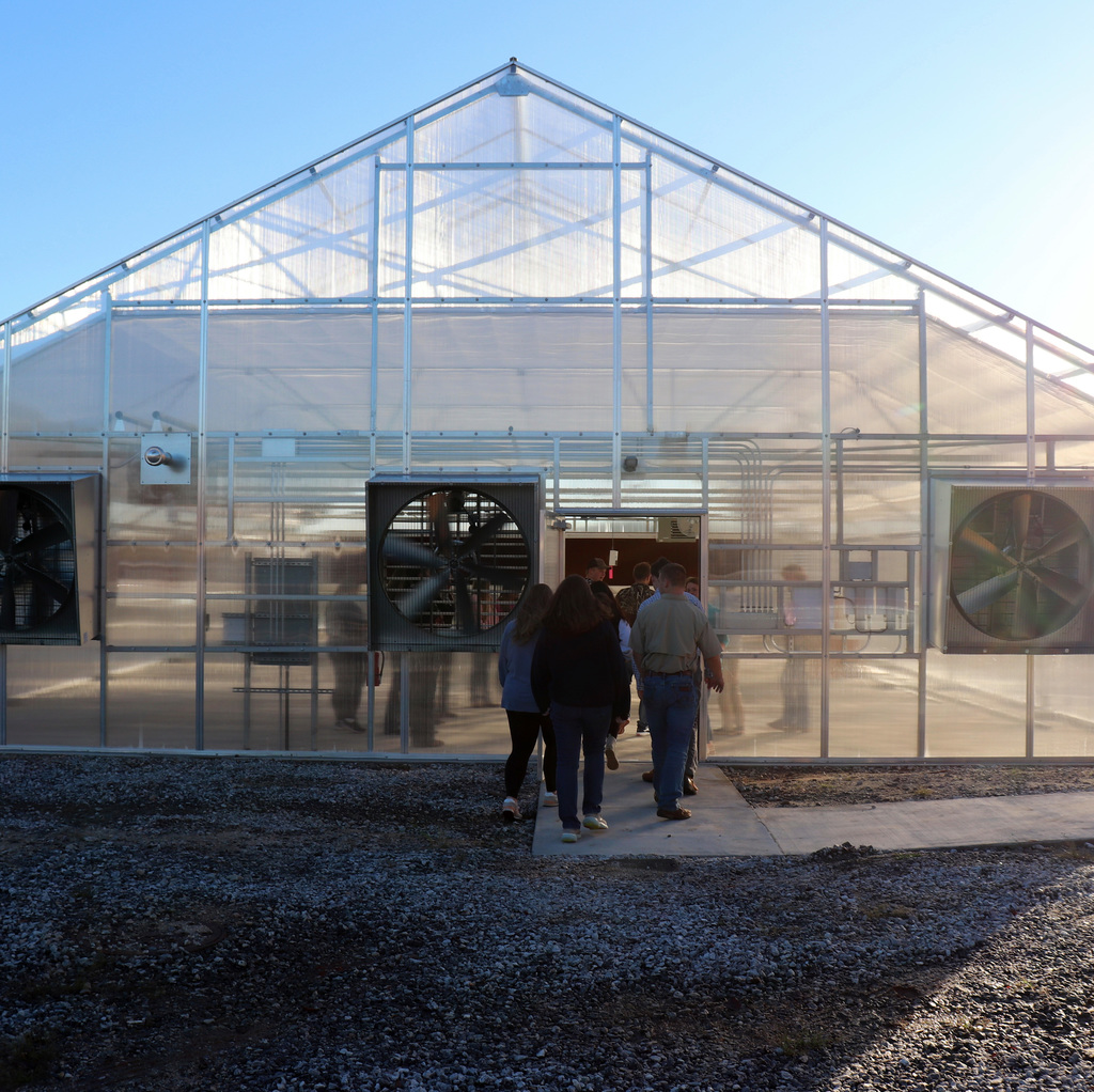 Clemson students visit the new greenhouse.