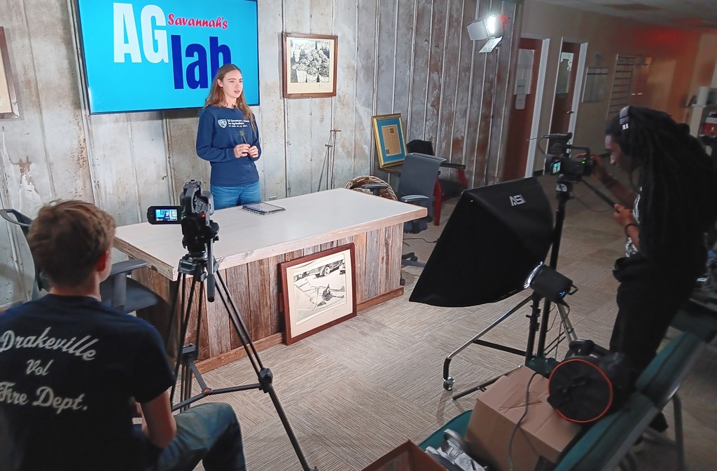 Savannah Smith hosts a mock educational show focused on agriculture.