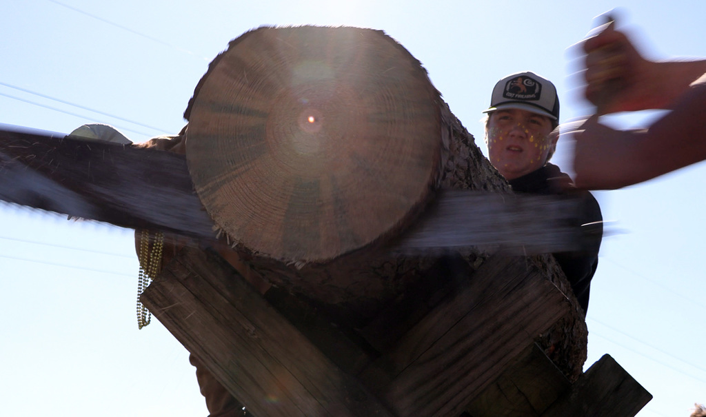 The moment of truth as the slices through the log in the lumberjack competition.