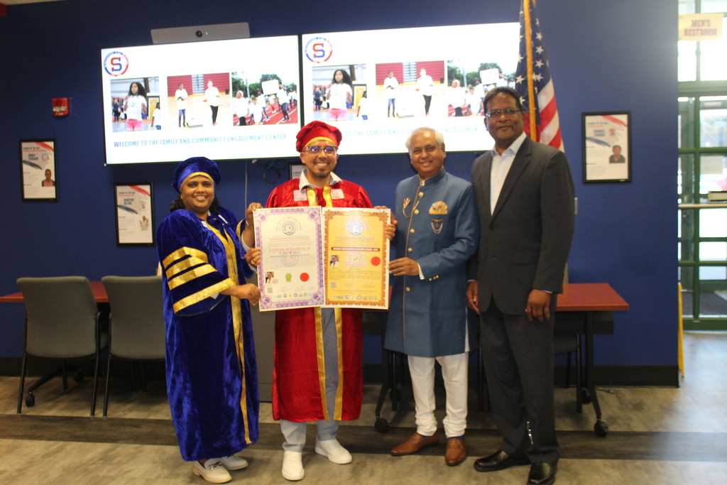 Photo of Dr. Cotto receiving award