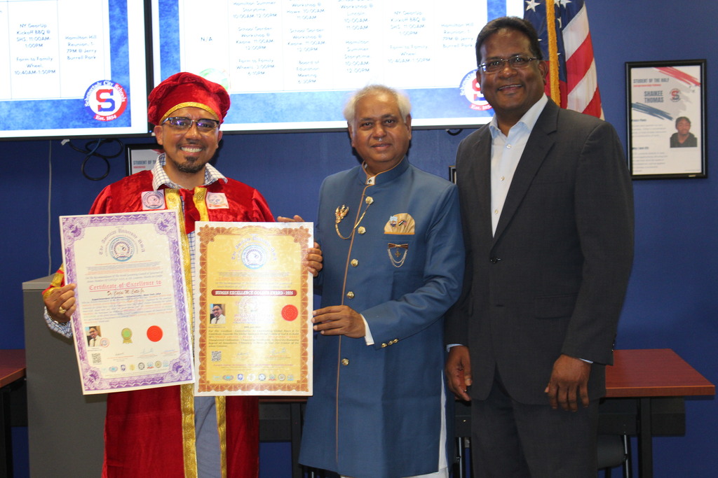 Photo of Dr. Cotto receiving award