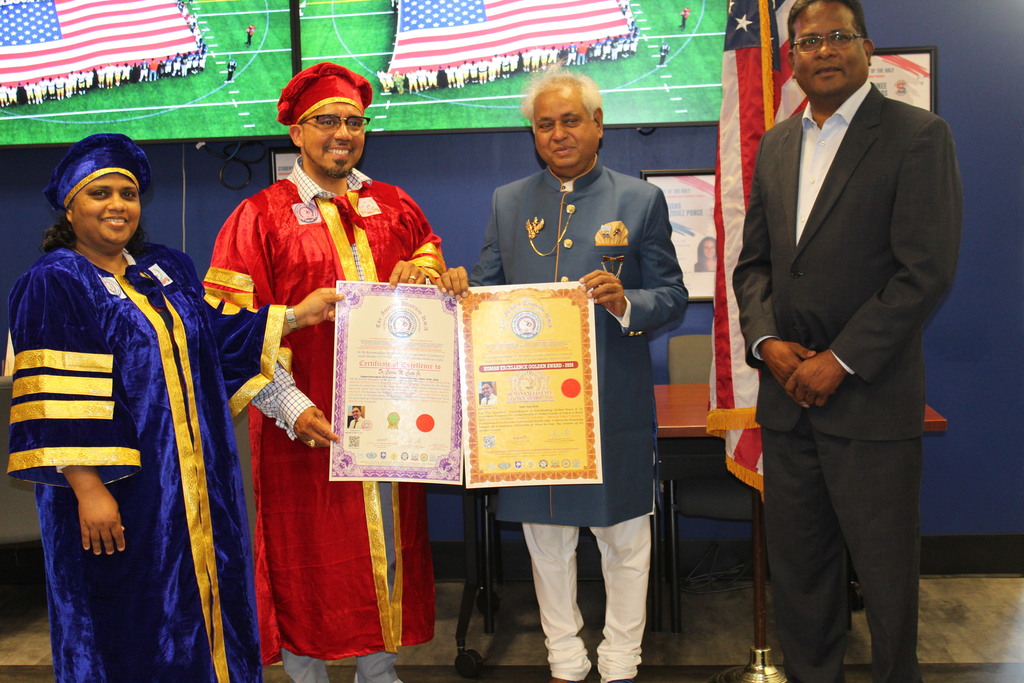 Photo of Dr. Cotto receiving award
