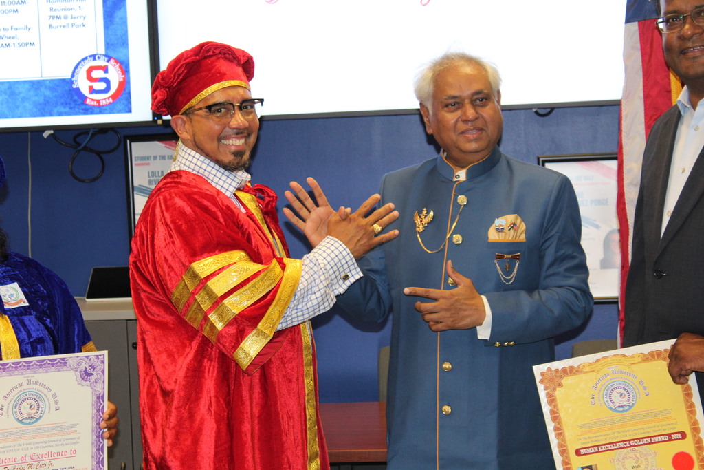 Photo of Dr. Cotto receiving award