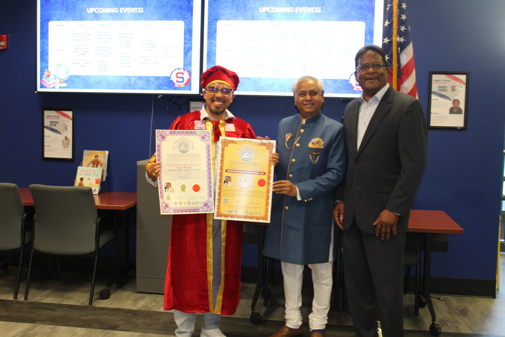 Photo of Dr. Cotto receiving award