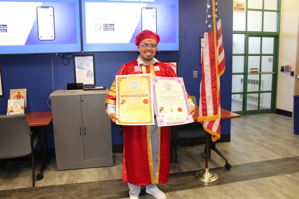 Photo of Dr. Cotto receiving award