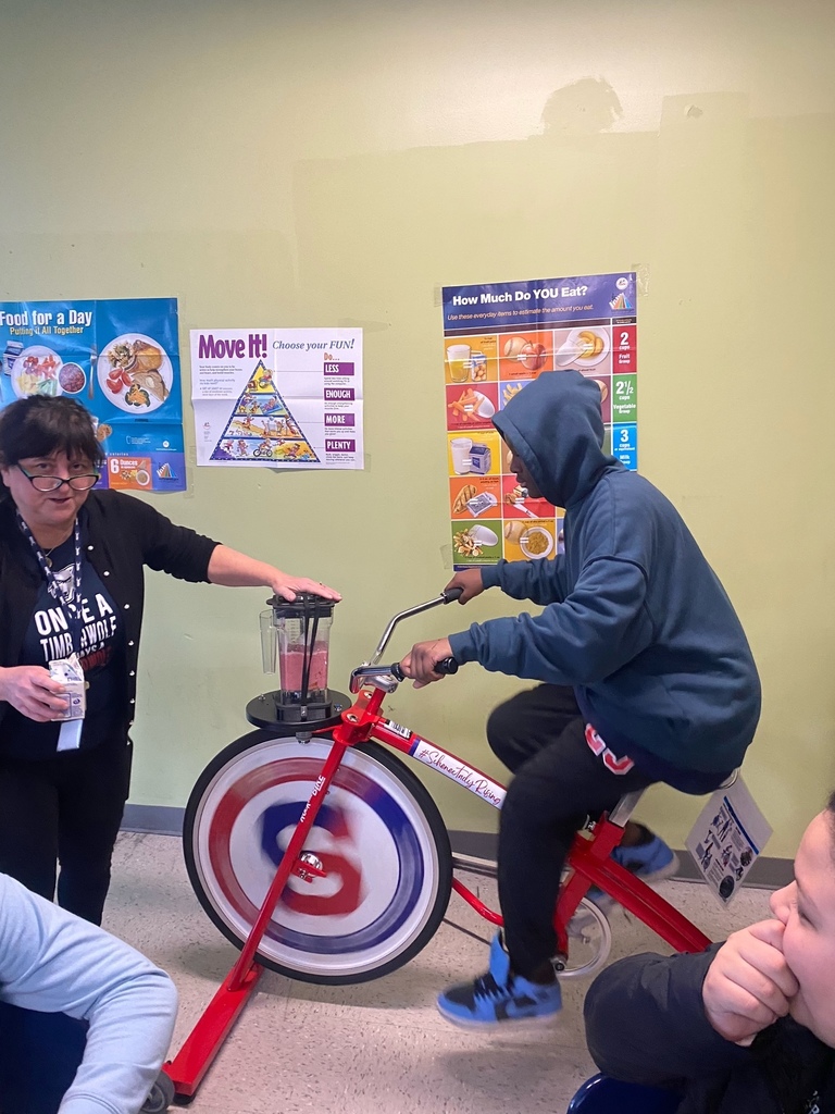 student on smoothie bike