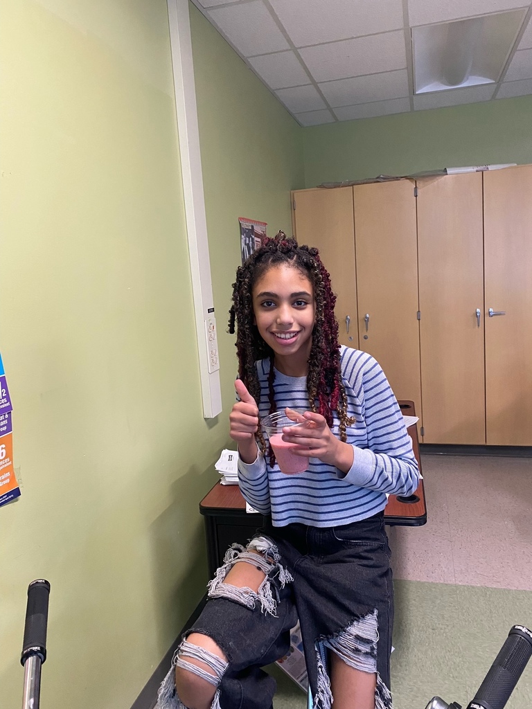 student tries smoothie after making it on bike