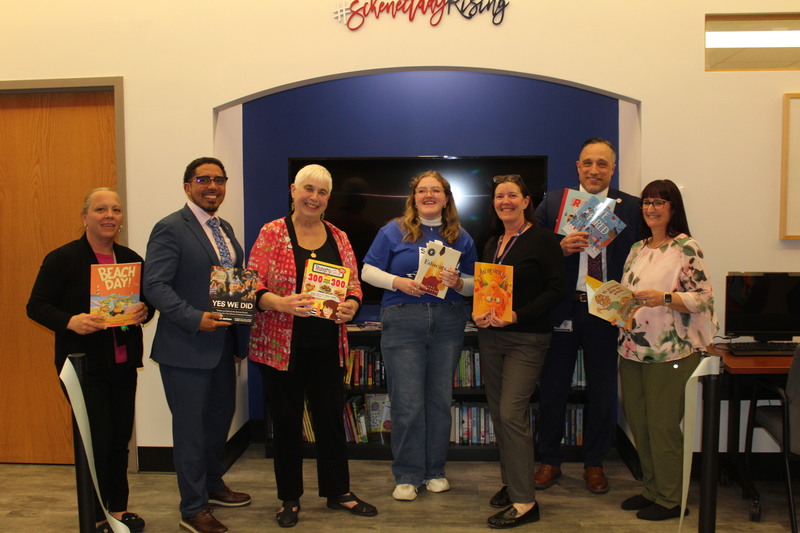 Photo:  Friends of Library Ribbon Cutting