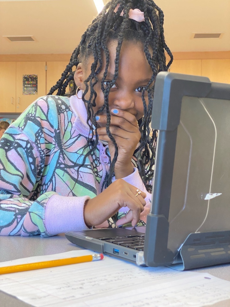 student smiles at camera