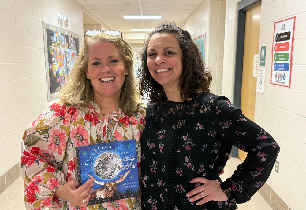 Kelly Grettler (left) and Sipple ES art teacher Marquis Stakes
