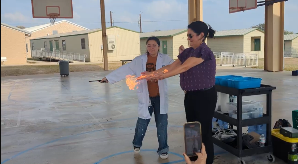 Superintendent Paige Meloni's hands were set on fire during a demonstration at Wilder Intermediate