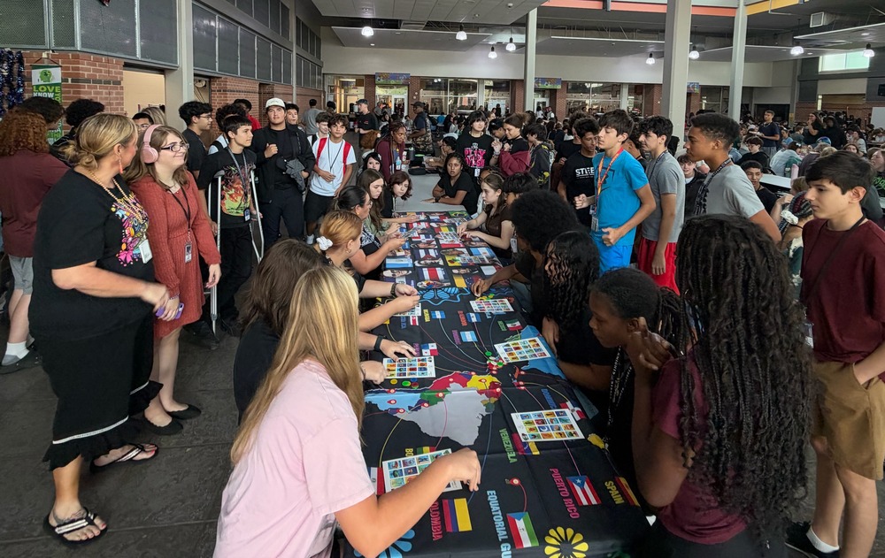 Students playing games in the cafe