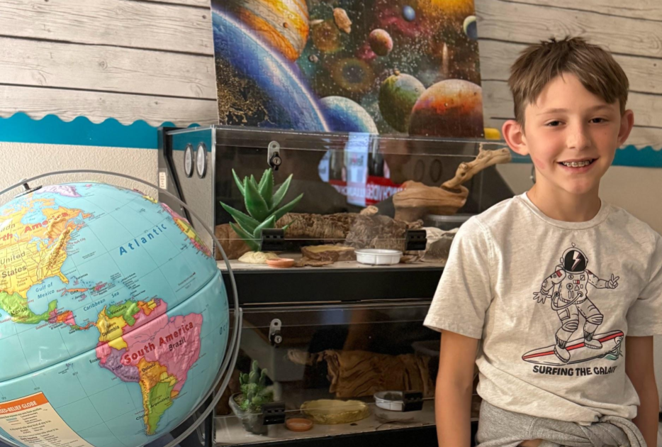 picture of Easton standing in  Science classroom