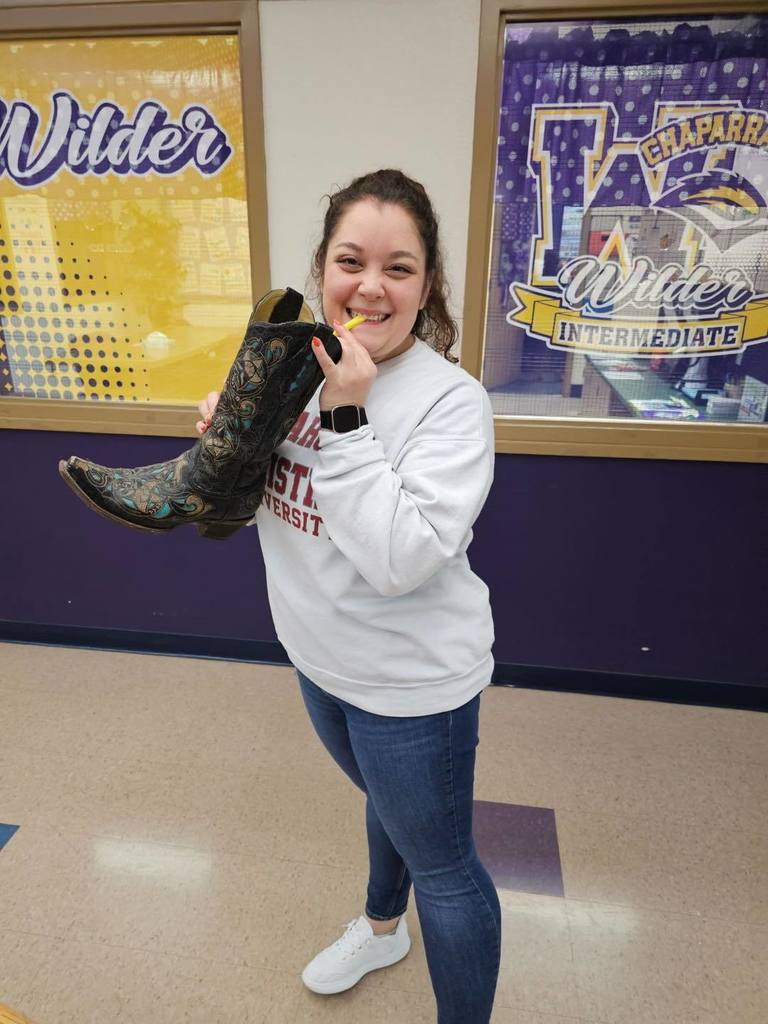 Ms. Gibbs drinking with anything but a cup.
