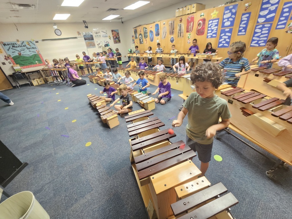 Kindergarten students playing instruments