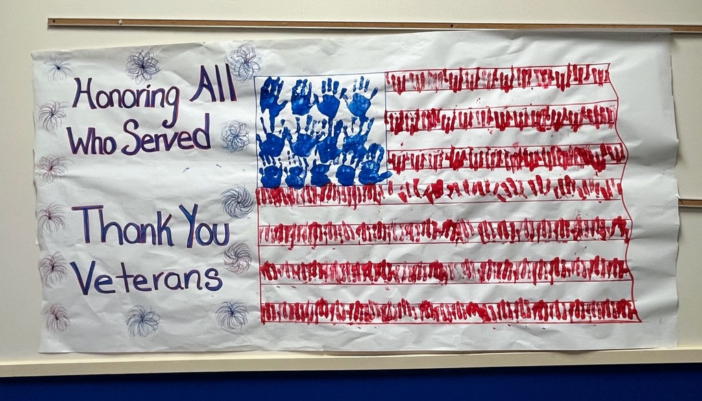 students artwork making the United States flag in honor of Veterans Day.