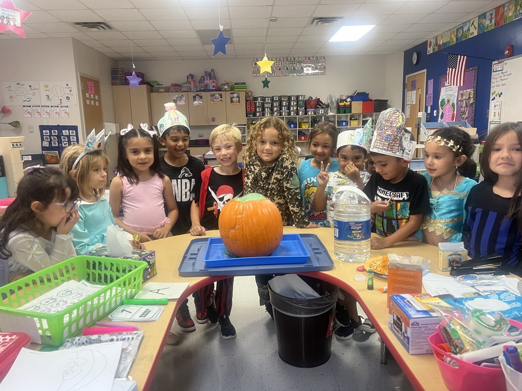 kindergarten students learning about the anatomy of pumpkins