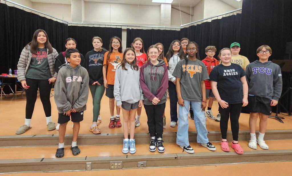 Students wearing their favorite college shirts.