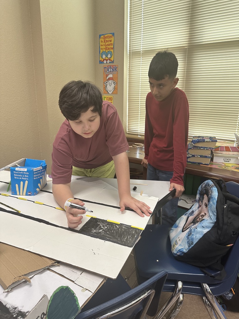 Students sketching out their geo city project.