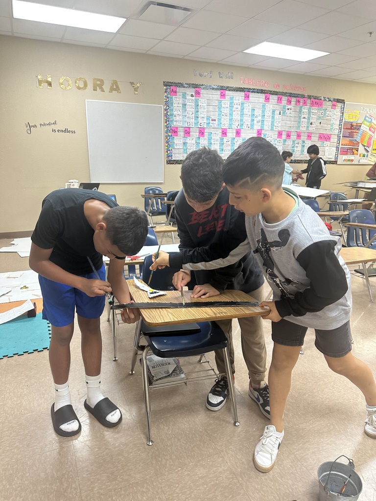 Boys hard at work on their geo city project.