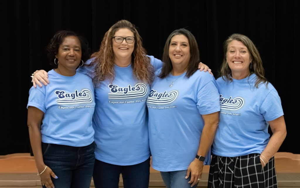front office staff posing together