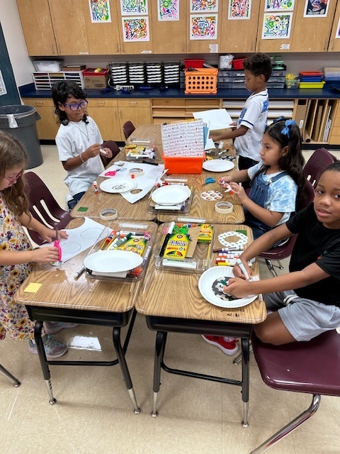 Students working on wildflowers in art.
