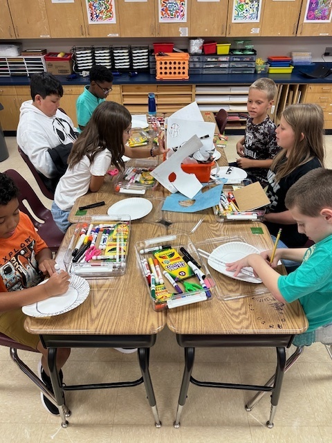 Students working on wildflowers in art.